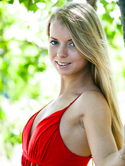Stella Lane sensually poses outdoors baring her delectable body.