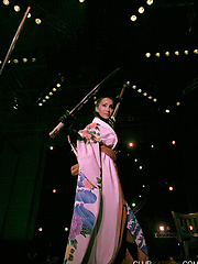 Katsuni signs DVDs and pole dances at a private party